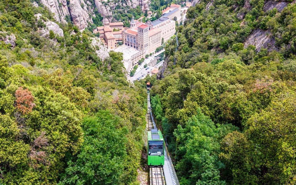 From Barcelona: Montserrat Monastery & Black Madonna With Train Tickets & Audio Guide (Montserrat + Train & Rack-Railway + Escolania Choir Access)