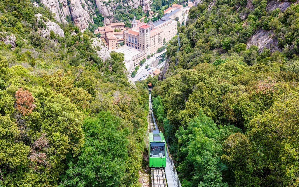 From Barcelona: Montserrat Monastery & Black Madonna With Train Tickets & Audio Guide (Montserrat + Train & Rack-Railway + Escolania Choir Access)