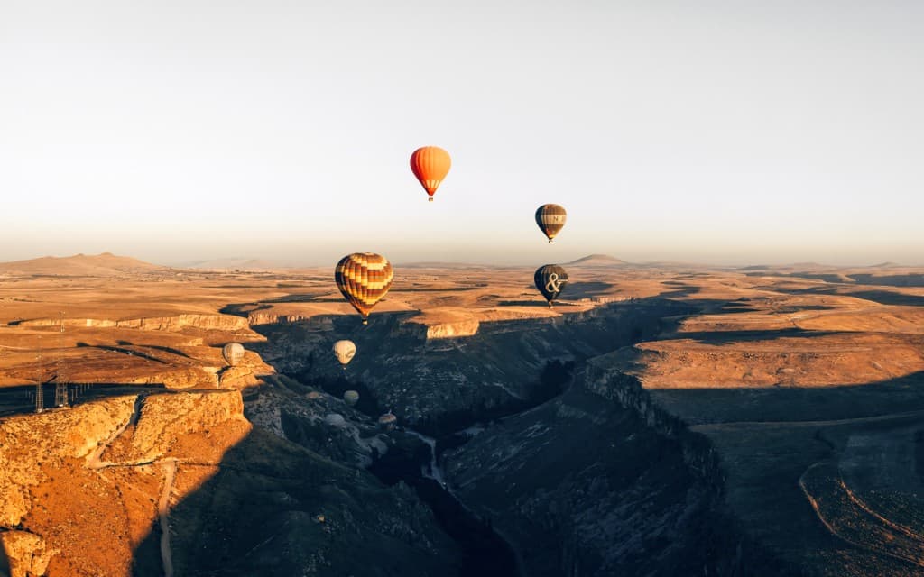 Soğanlı Valley Sunrise Hot Air Balloon Tour with Breakfast & Transfers (Sunrise Tour with Transfers & Refreshments)